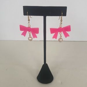 Z54 New (without tags) Costume jewelry- Dangle earrings that have pink bows.